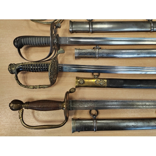 154 - Range of replica swords and mix of metal and leather scabbards with British 1805 pattern Royal Navy ... 