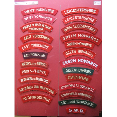 183 - Infantry cloth shoulder title collection mounted on 4 boards with double sided tape. Mainly embroide... 