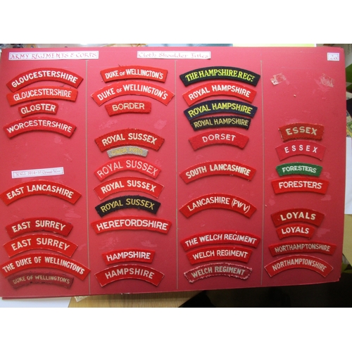 183 - Infantry cloth shoulder title collection mounted on 4 boards with double sided tape. Mainly embroide... 