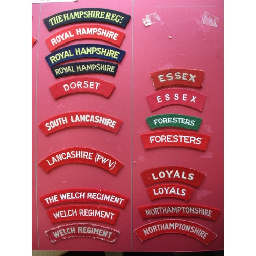 183 - Infantry cloth shoulder title collection mounted on 4 boards with double sided tape. Mainly embroide... 