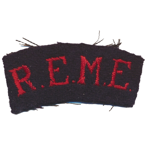 189 - WW2 R.E.M.E. cloth shoulder title, red embroidered lettering on black background, frayed edges, prob... 