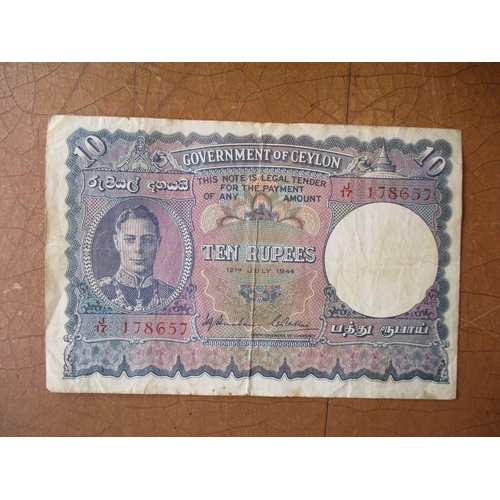 269 - World range with India 1937 10r Deshmukh very fine, Malaya 1941 $5 very fine, Thailand 1945 50 Baht ... 