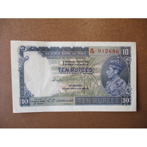 269 - World range with India 1937 10r Deshmukh very fine, Malaya 1941 $5 very fine, Thailand 1945 50 Baht ... 