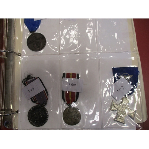 69 - World range in album and loose with France WW2 Medal with Liberation clasp, Dunkerque Veterans Medal... 