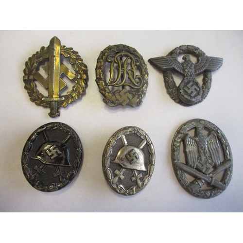 70 - Third Reich range in tin with Kuban Shield, Krim Shield (2), Auxiliary Cruiser War Badge, Minesweepe... 