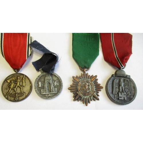 71 - Third Reich. Collection of medals including 1914 Iron Cross 2nd Class, 1939 Iron Cross 2nd Class, Wa... 