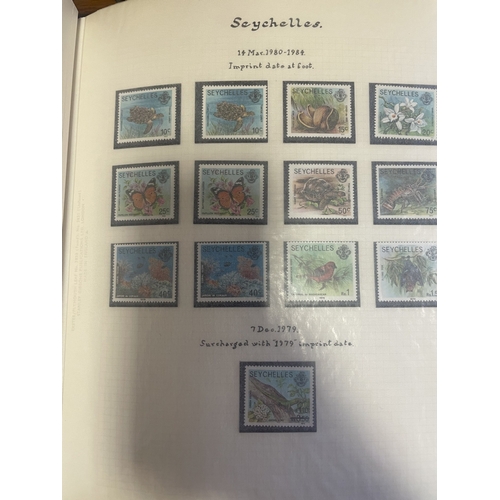 62 - A mint and used QV-QEII A-Z BC coln in 3 Devon albums with New Zealand, Seychelles, St Helena, Hong ... 