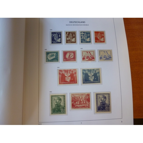 216 - DDR. Presumed all UM coln in 5 SG Davo albums, from 1949 to 1990, incl 1950-1 set of 5, 1950 Death o... 