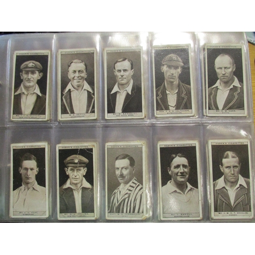 13 - Collection in 2 albums plus 8 stock books with complete sets including Ogdens Boy Scouts, Cricket 19... 