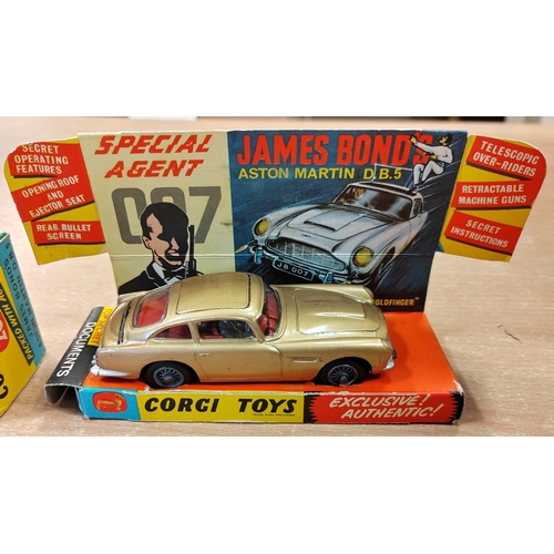 217 - Corgi. James Bond Aston Martin DB5 No.261 gold with red interior, 