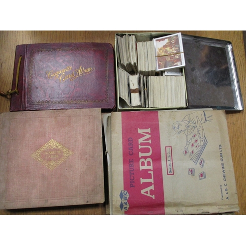 3 - Collection in album, loose and stock books including ranges from Gallaher, Imperial Tobacco, Players... 