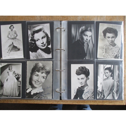 63 - Misc. coln. in 2 modern albums. Film star and actress range, some signed.  Molle Regine Flory, Carol... 