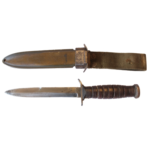 129 - U.S. M3 trench knife with M8 scabbard, blade unmarked, crossguard face marked US M3/Camillus, scabba... 