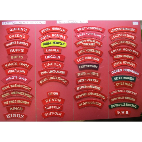 146 - Infantry cloth shoulder title collection mounted on 4 boards with double sided tape. Mainly embroide... 