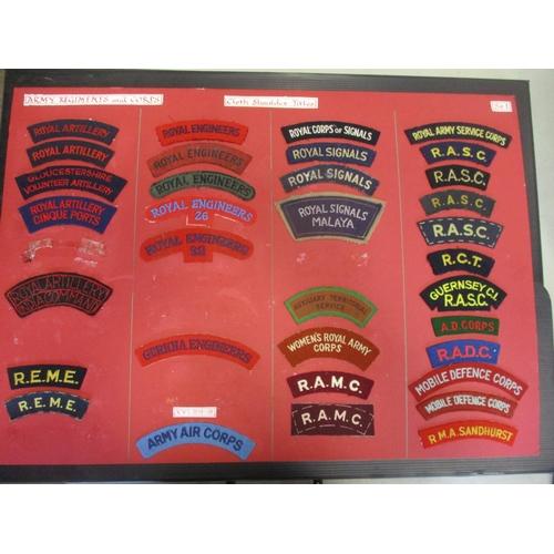 147 - Cloth shoulder title collection mounted on 5 boards with double sided tape, in a carrying case. Main... 