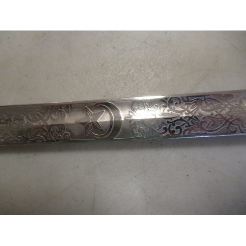 130 - Turkish officer's sword, circa WW1, blade 40% ornately etched to both sides including trophy of arms... 