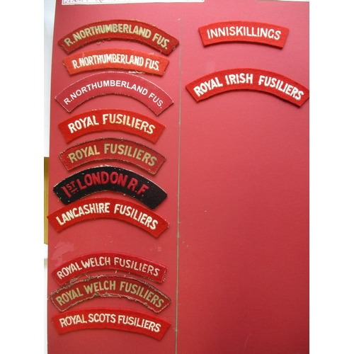 146 - Infantry cloth shoulder title collection mounted on 4 boards with double sided tape. Mainly embroide... 