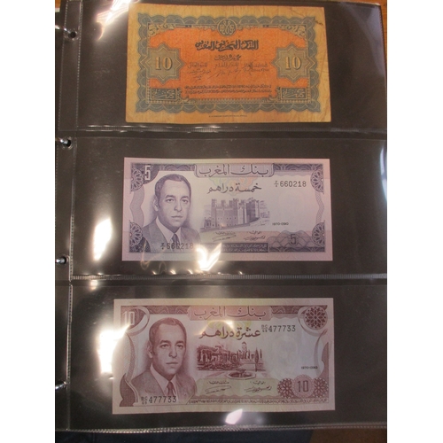 276 - Collection of mostly Africa and Oceania banknotes in 3 albums, largely mid to late 20th century, gen... 