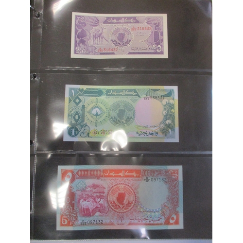 276 - Collection of mostly Africa and Oceania banknotes in 3 albums, largely mid to late 20th century, gen... 