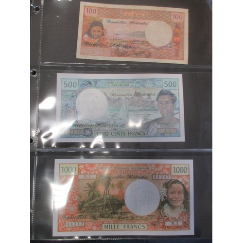 276 - Collection of mostly Africa and Oceania banknotes in 3 albums, largely mid to late 20th century, gen... 