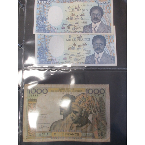 278 - Collection of largely Africa, Asia and Caribbean banknotes in 3 albums, majority 20th century, gener... 