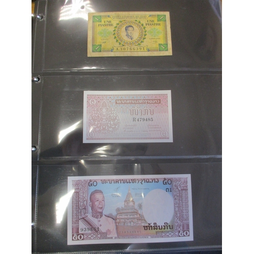 278 - Collection of largely Africa, Asia and Caribbean banknotes in 3 albums, majority 20th century, gener... 