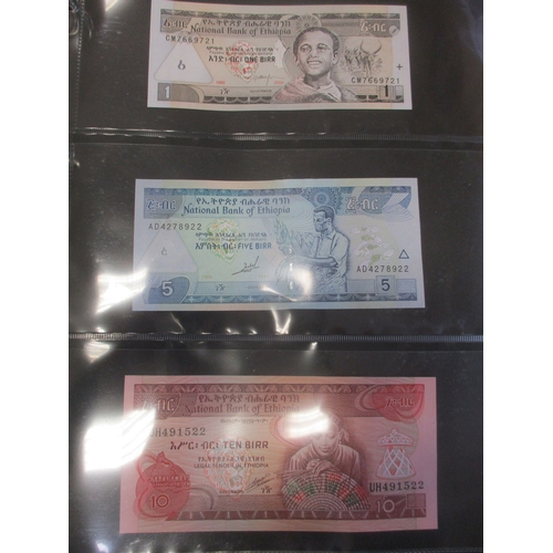 278 - Collection of largely Africa, Asia and Caribbean banknotes in 3 albums, majority 20th century, gener... 