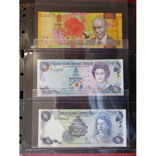 283 - World collection in album with generally uncirculated Falkland Is £5 2005, £10 2011, £20 2011, Canad... 