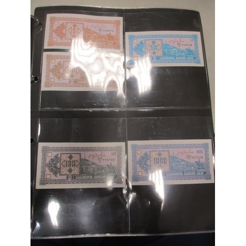 286 - Collection of largely Asia, Eastern Europe and USSR/Russia banknotes in 4 albums, generally very fin... 