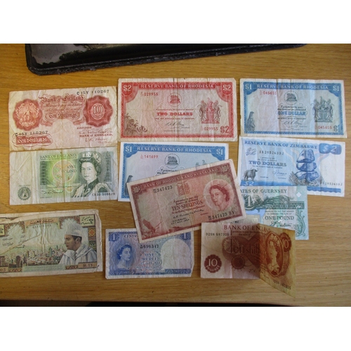 295 - Banknotes world accumulation including Rhodesia & Nyasaland 1952 10/-, GB £1 Peppiatt 04L, Rhodesia,... 