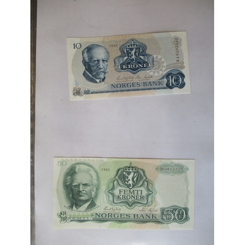 301 - World collection in album with China, Germany, Switzerland, Libya 1963 half pound very fine, etc. (V... 