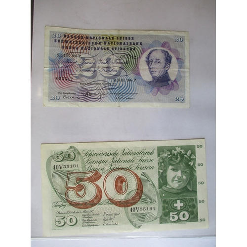 301 - World collection in album with China, Germany, Switzerland, Libya 1963 half pound very fine, etc. (V... 