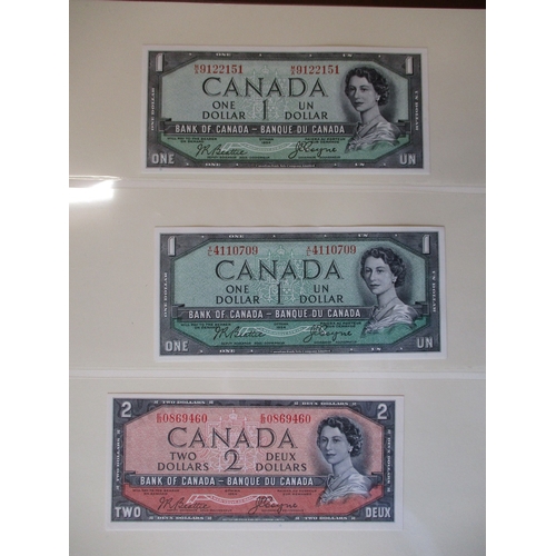 313 - Canada. Collection generally uncirculated with 1935 $1 English extremely fine, 1954 Beattie/ Coyne $... 