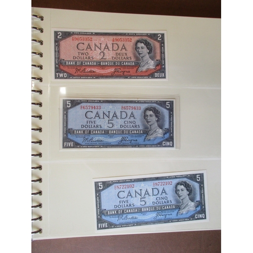 313 - Canada. Collection generally uncirculated with 1935 $1 English extremely fine, 1954 Beattie/ Coyne $... 