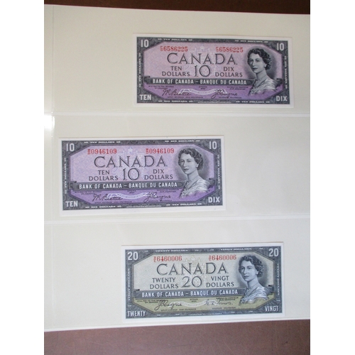 313 - Canada. Collection generally uncirculated with 1935 $1 English extremely fine, 1954 Beattie/ Coyne $... 