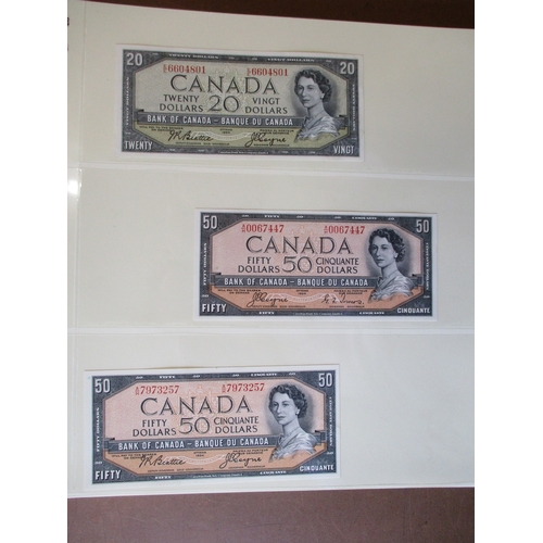 313 - Canada. Collection generally uncirculated with 1935 $1 English extremely fine, 1954 Beattie/ Coyne $... 