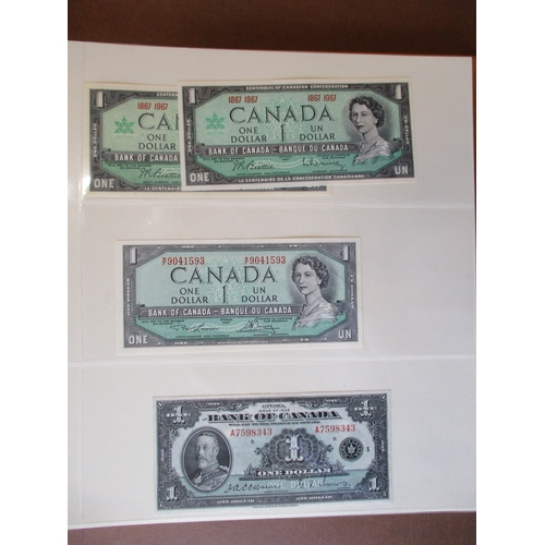 313 - Canada. Collection generally uncirculated with 1935 $1 English extremely fine, 1954 Beattie/ Coyne $... 