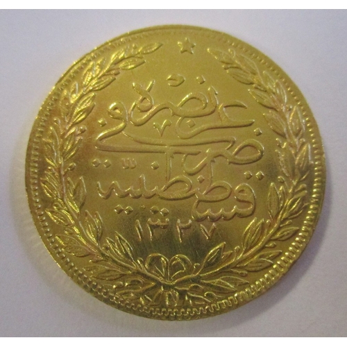 726 - Investment Gold lot - documents required. Turkey. 1909 100 kurush extremely fine. (Y)