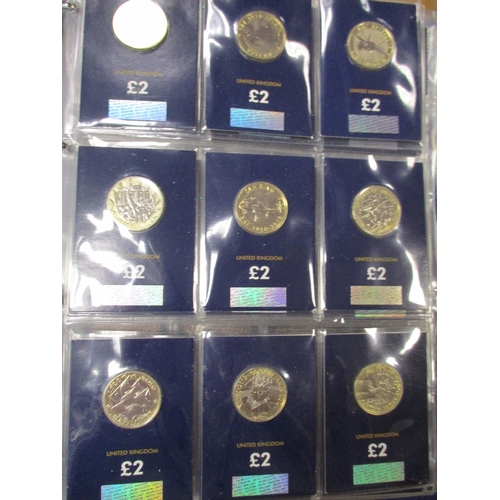 747 - Collection in 3 Change Checker albums with £2, £1, 50'ps including 2009 Kew Gardens 50p (2), crowns,... 