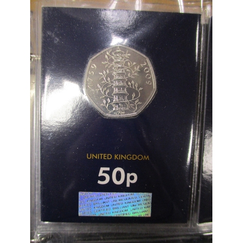 747 - Collection in 3 Change Checker albums with £2, £1, 50'ps including 2009 Kew Gardens 50p (2), crowns,... 