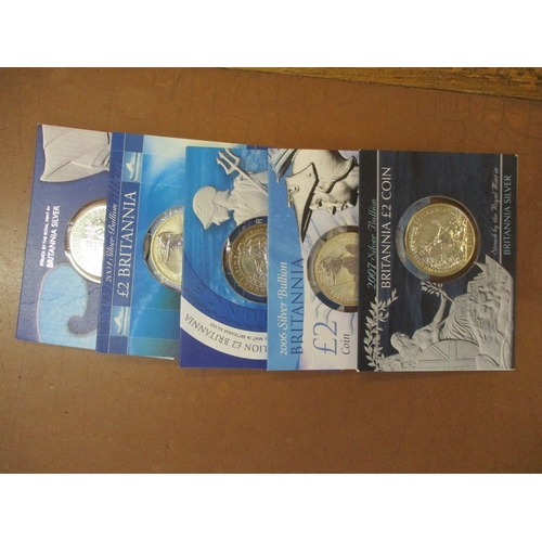 768 - Britannia silver £2's uncirculated in Royal Mint cards and folders with 2003-2007, 2009-2012 and 201... 