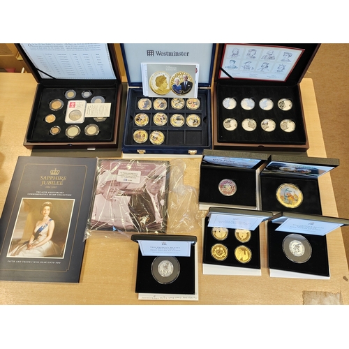 864 - Collection of mostly crown sized uncirculated/silver proofs from Royal Mint, Westminster, Jubilee Mi... 