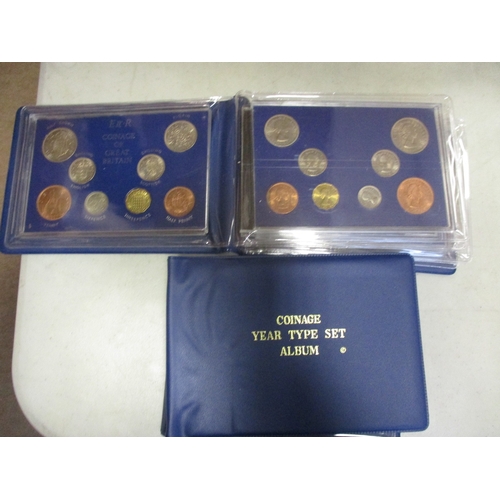 899 - World collection, strength in GB including year type sets in album in 2 albums, 1953 cased sets (2),... 