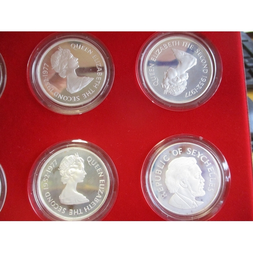 902 - 1977 Silver Jubilee proof cased set of 8 by Spink, mainly FDC, odd with slight discolouration. (R)