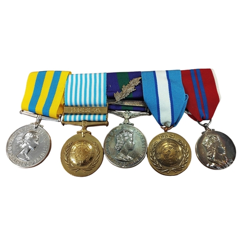 96 - Collection of medals mixed condition, range mounted on bar with Korea Medal to 22494309 Gnr A.Kember... 