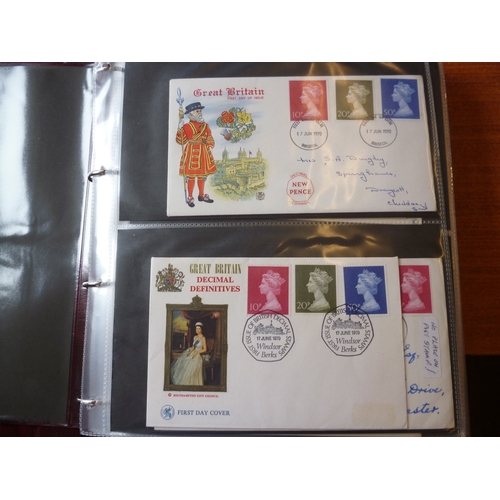 317 - 1970 to 2005 FDCs coln in 12 albums, incl replica 'gold' foil insert FDCs from 1980-83. (2B)