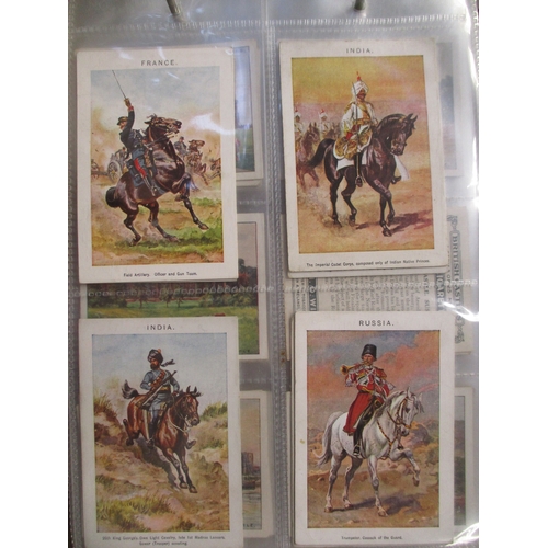 10 - Collection in 4 albums and loose including ranges from Churchman Prominent Golfers (regular size (19... 