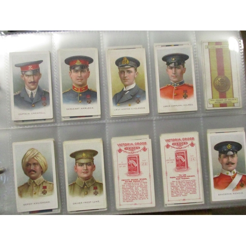 13 - Collection in 4 albums with complete sets including L&B Birds and Eggs, Mitchell Army Ribbons & Butt... 