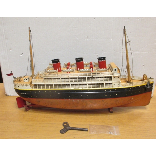 152 - Bing. Tinplate clockwork (with key) three funnelled ocean liner, 400mm x 9mm, red/ black hull with w... 