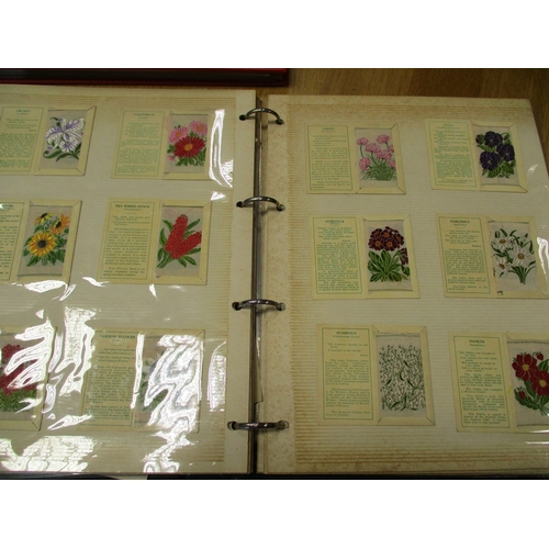 21 - Collection in stock books, loose and paper albums including Wix Kensitas flags, flowers, medals, oth... 